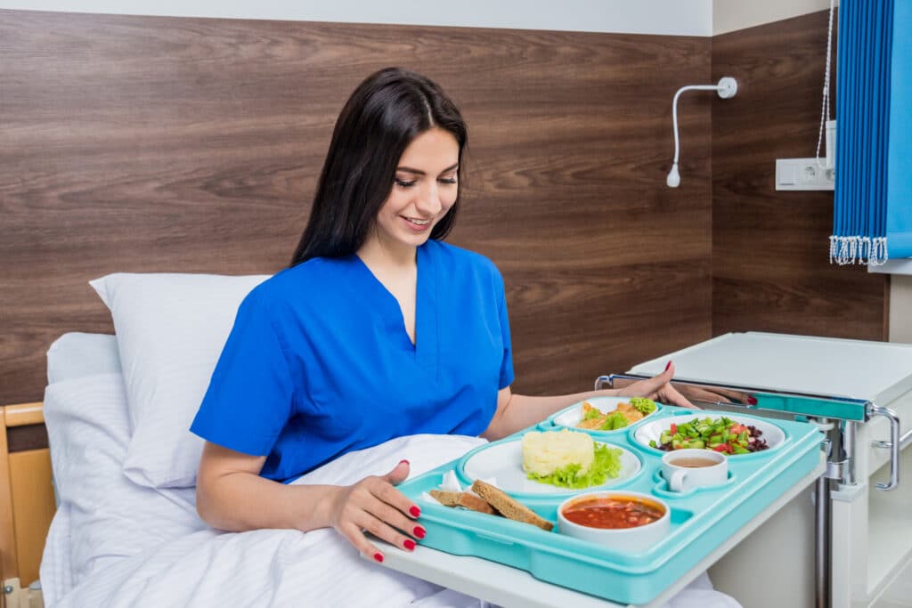 Helping with meals, hygiene, and rest